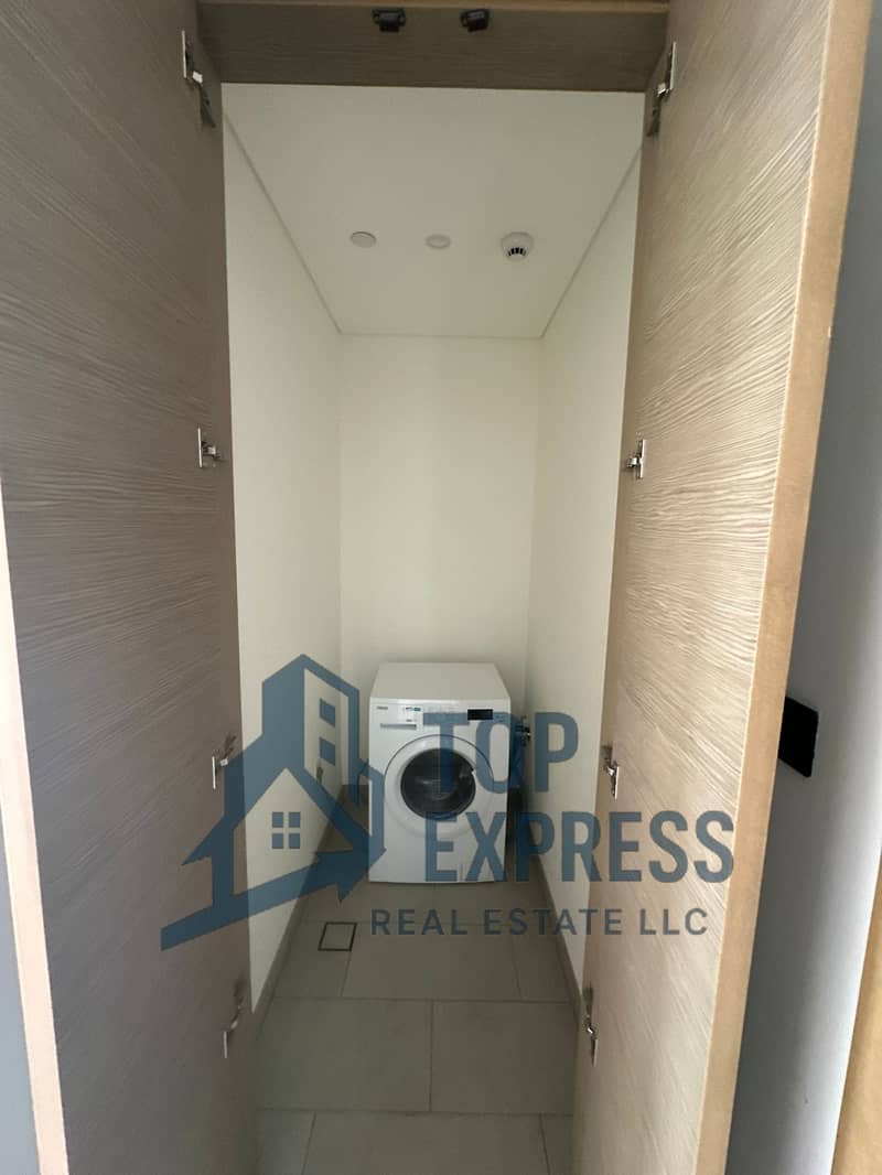 Elegant 1Bedroom + Study | Burj khalifa & community Views | Laundry Room | Unfurnished - Image 6
