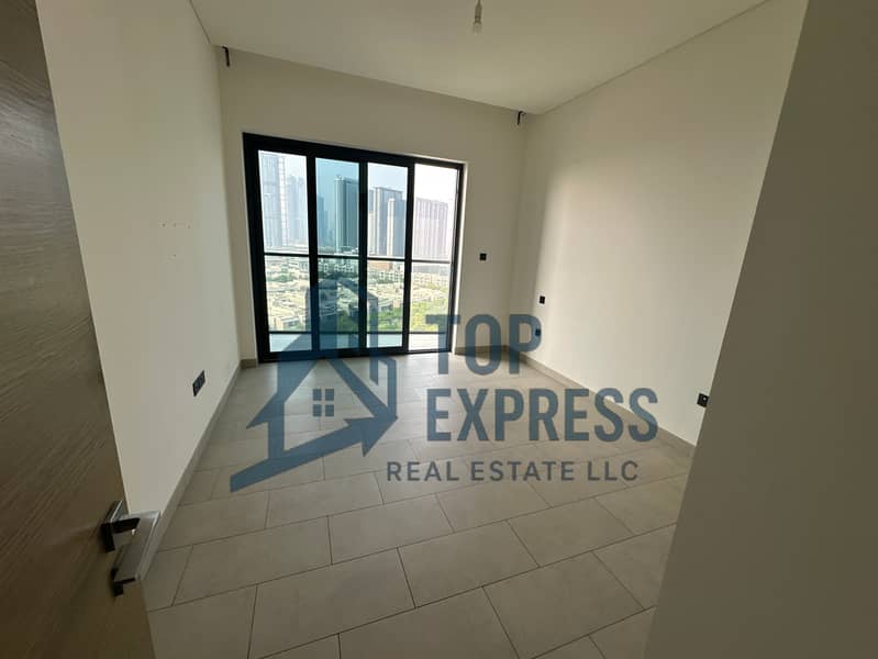 Elegant 1Bedroom + Study | Burj khalifa & community Views | Laundry Room | Unfurnished - Image 9