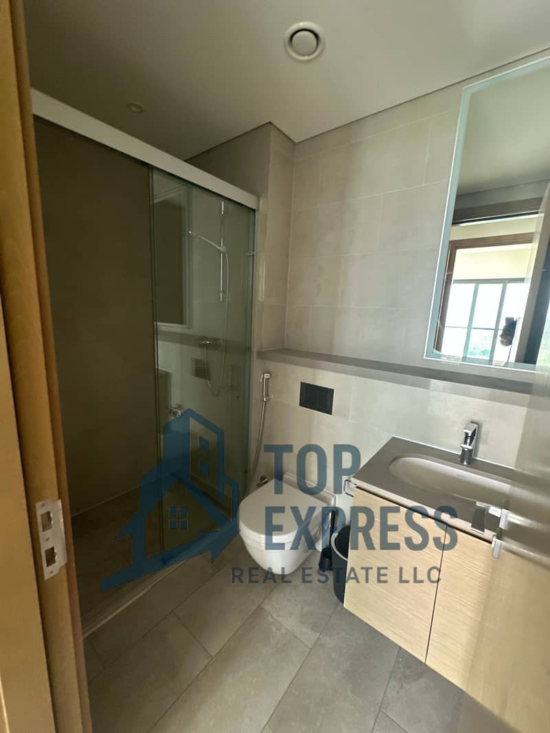 Elegant 1Bedroom + Study | Burj khalifa & community Views | Laundry Room | Unfurnished - Image 11