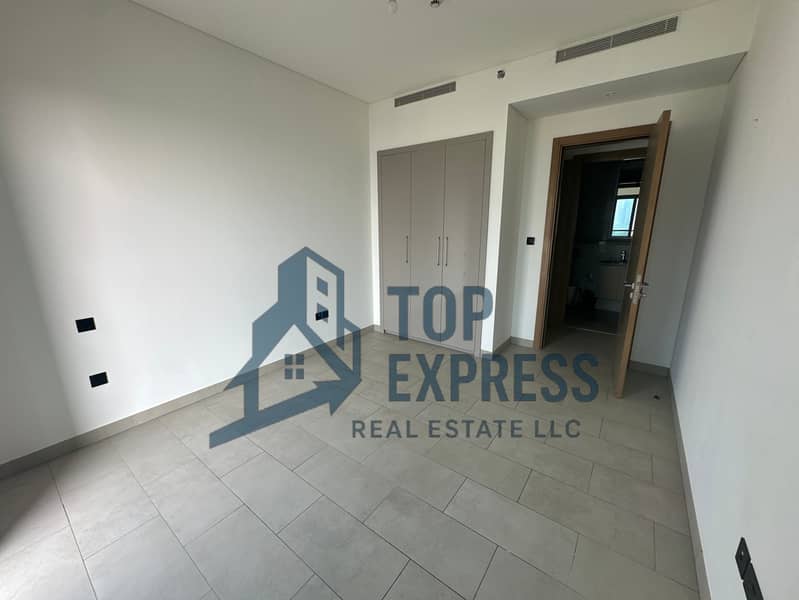 Elegant 1Bedroom + Study | Burj khalifa & community Views | Laundry Room | Unfurnished - Image 10