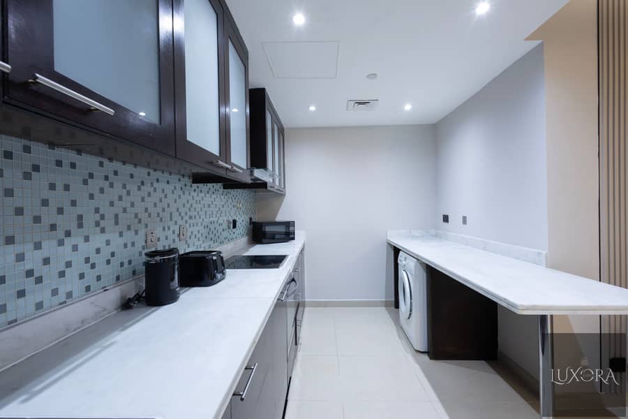 Stylish 2BR in Ubora Tower, Business Bay | Wide Balcony | Pool & Gym - Image 6