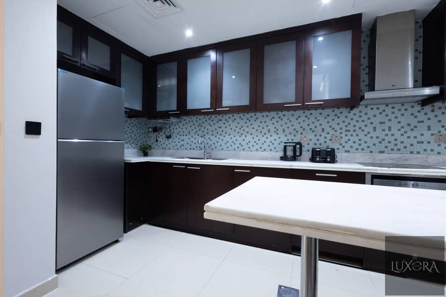 Stylish 2BR in Ubora Tower, Business Bay | Wide Balcony | Pool & Gym - Image 7