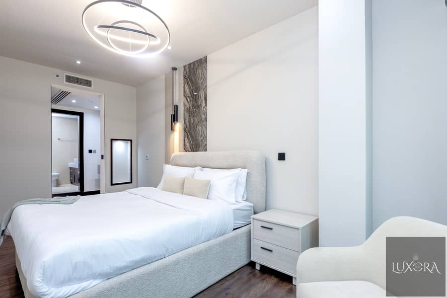 Stylish 2BR in Ubora Tower, Business Bay | Wide Balcony | Pool & Gym - Image 8