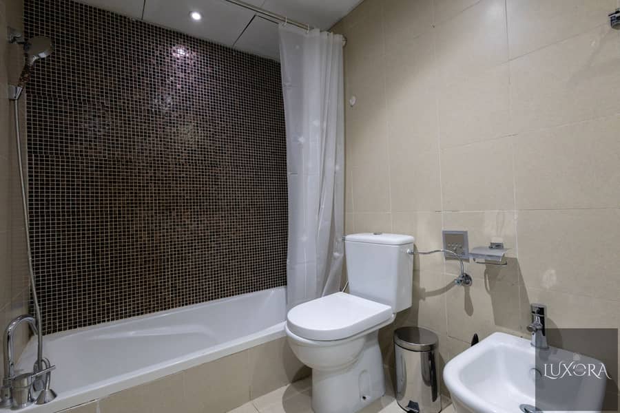 Stylish 2BR in Ubora Tower, Business Bay | Wide Balcony | Pool & Gym - Image 11