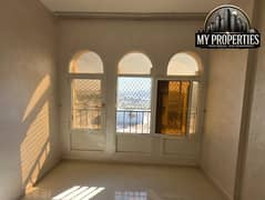 Apartment in Al Nakheel, Ras Al Khaimah, with a prime location and a stunning view. "