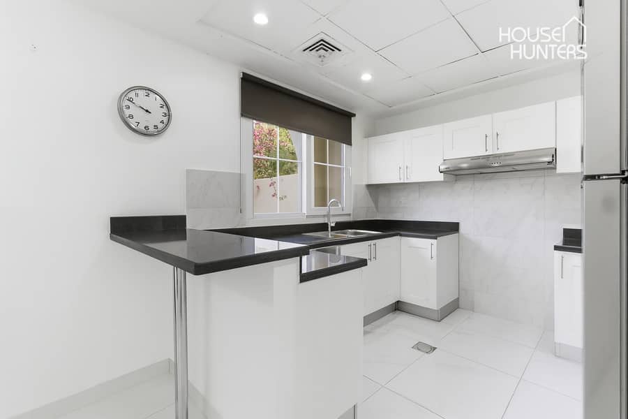 White Upgraded Kitchen | Available December