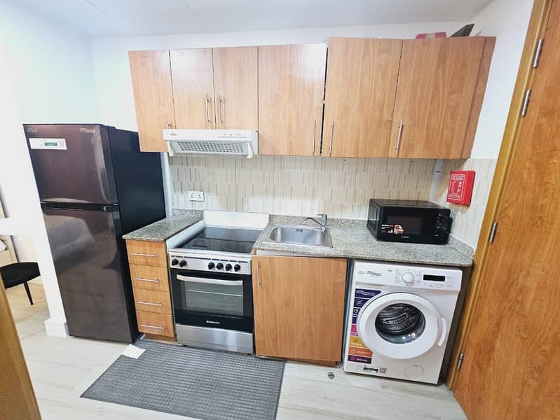 Newly Furnished || Modern Design Studio || With Pool View || Near Me'aisem City Centre - Image 12