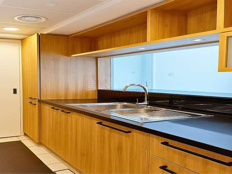 Pool & Community View | Upgraded Unit | Spacious Living Room - Image 6