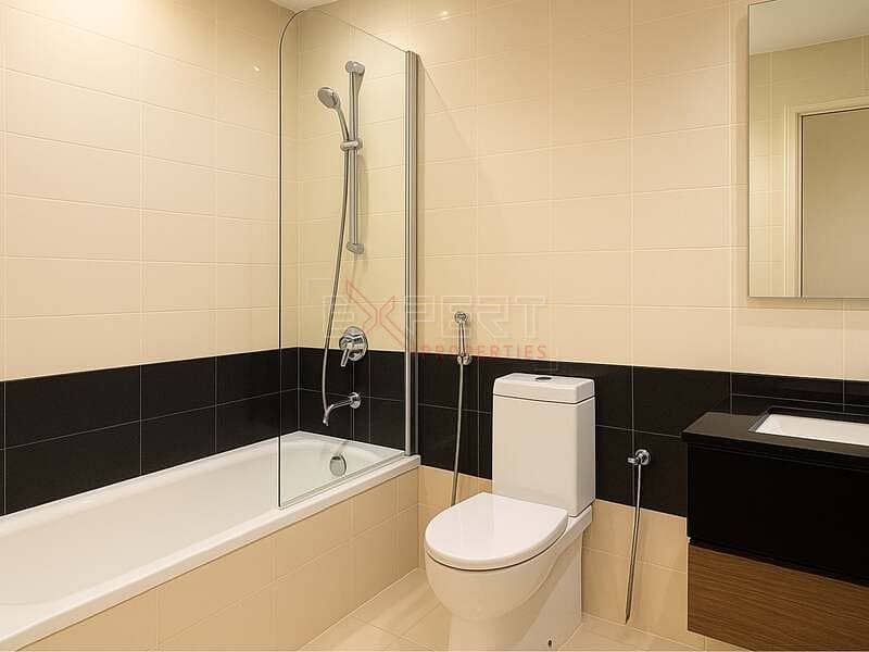 Pool & Community View | Upgraded Unit | Spacious Living Room - Image 8