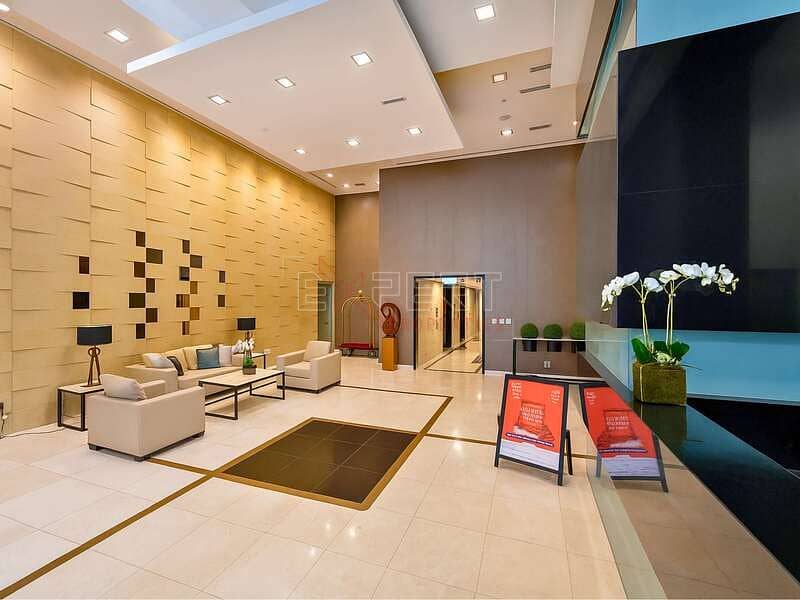 Pool & Community View | Upgraded Unit | Spacious Living Room - Image 9