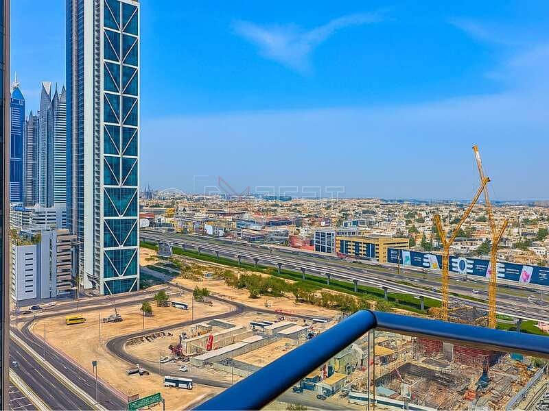 Pool & Community View | Upgraded Unit | Spacious Living Room - Image 12