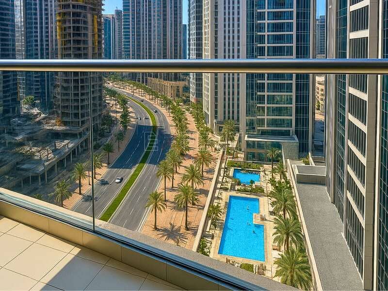 Pool & Community View | Upgraded Unit | Spacious Living Room - Image 13