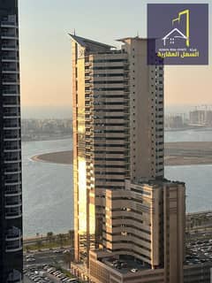 شقة غرفتين نوم ،صالة وموقف سيارات بموقع استراتيجي