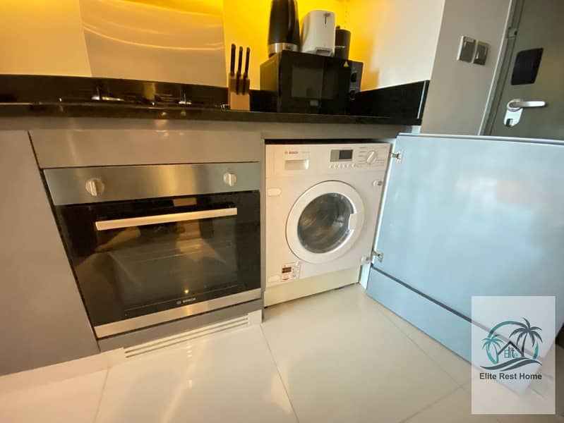 Luxury Fully Furnished Studio for Daily Rent in DAMAC Maison Prive | Canal Views, Modern Amenities, Prime Business Bay Location - Image 9