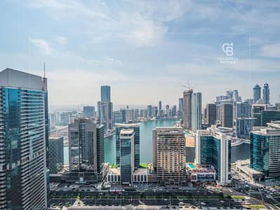 2 Bedroom Apartment for Rent in Downtown Dubai, Dubai - Fully Furnished - Canal View - High Floor