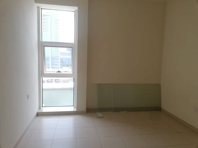 1BR | Unfurnished | Partial lake view....