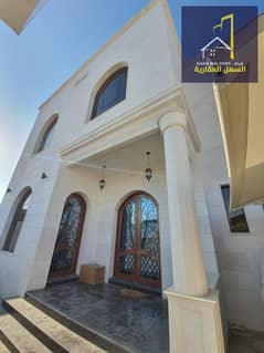 New villa for sale in Al Sabkha – Sharjah Total area: 2,797 sq ft Built-up area: 2,474 sq ft General Features: • Electric gate • Parking spaces