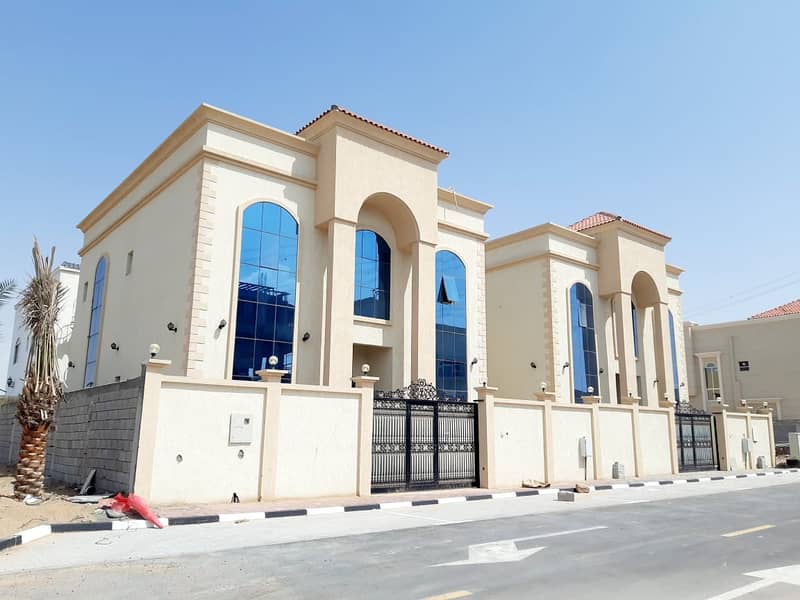 Villa for sale in Ajman Helio and Jasmine freehold villa with electricity and water on a street