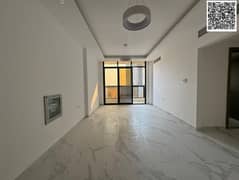 مع شهر فري,للايجار السنوي اجمل شقه غرفتين وصاله اول ساكن الجرف3| مطبخ مزود ب غاز وفرن ,تكييف مركزي ,بلكون | قريب من المدارس مخرج دبي|مع باركينج فري