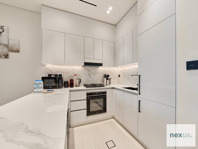 Stylish 2BR Retreat in JVC | Binghatti Galaxy - Image 11