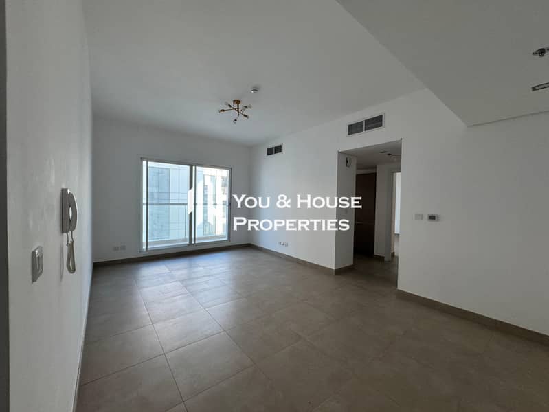 Neat & Spacious 1BR with Balcony | Closed Kitchen | Prime Location