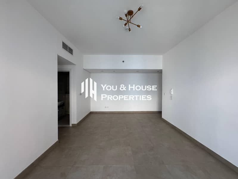 Neat & Spacious 1BR with Balcony | Closed Kitchen | Prime Location