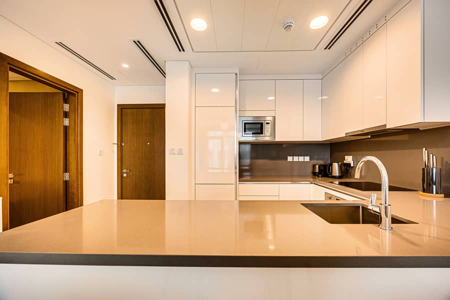 New 1 bedroom in Al-Wasl offering a serene canal-side setting