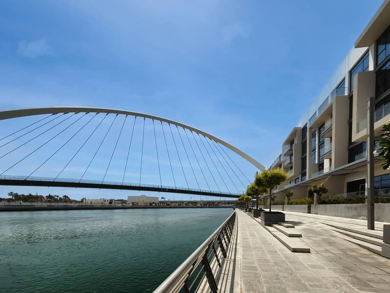 New 1 bedroom in Al-Wasl offering a serene canal-side setting - Image 10