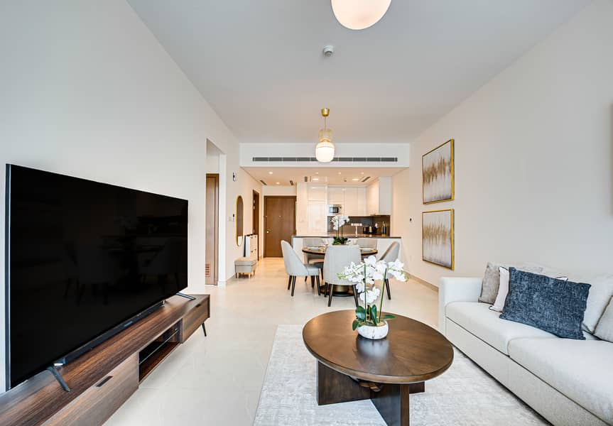 New 1 bedroom in Al-Wasl offering a serene canal-side setting - Image 11