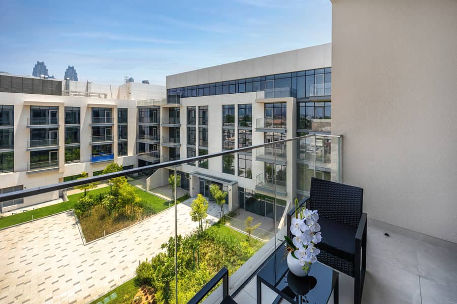 New 1 bedroom in Al-Wasl offering a serene canal-side setting - Image 16