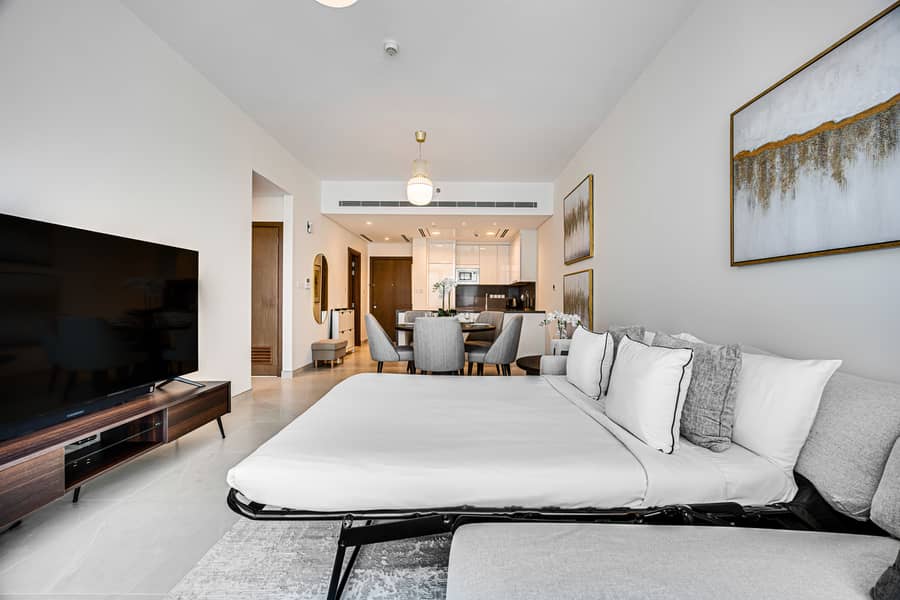 New 1 bedroom in Al-Wasl offering a serene canal-side setting - Image 26