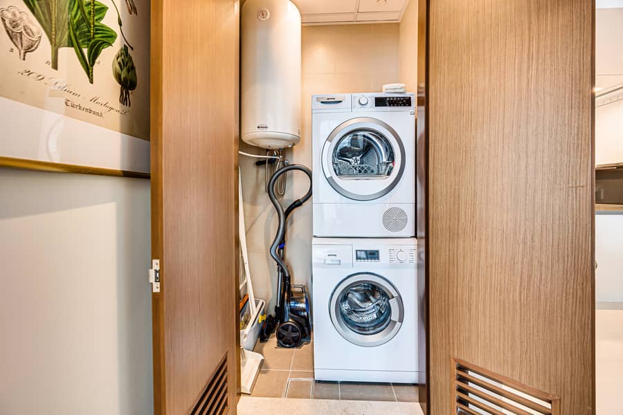 New 1 bedroom in Al-Wasl offering a serene canal-side setting - Image 27