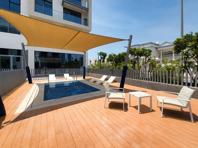 New 1 bedroom in Al-Wasl offering a serene canal-side setting - Image 30