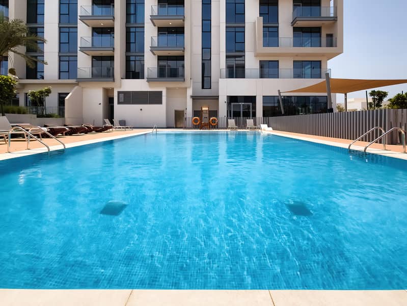 New 1 bedroom in Al-Wasl offering a serene canal-side setting - Image 32