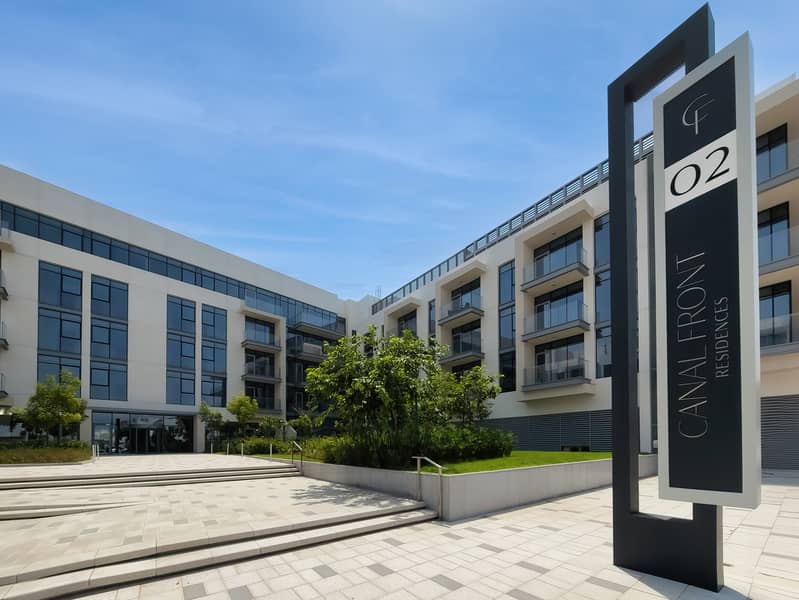 New 1 bedroom in Al-Wasl offering a serene canal-side setting - Image 37