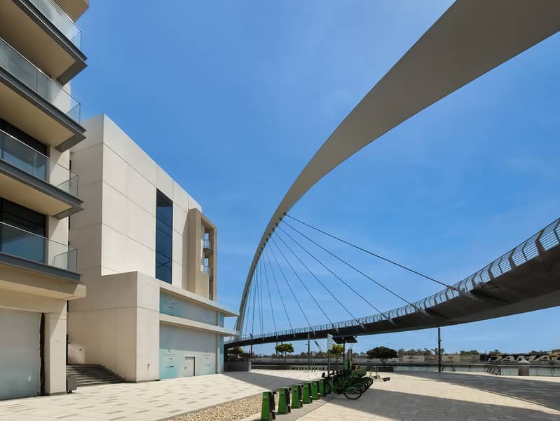 New 1 bedroom in Al-Wasl offering a serene canal-side setting - Image 39