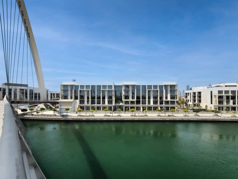 New 1 bedroom in Al-Wasl offering a serene canal-side setting - Image 42