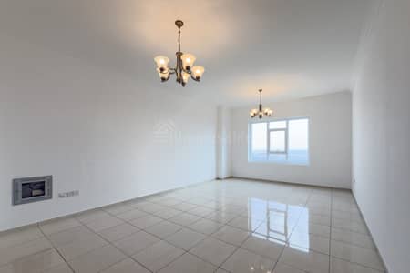 شقة 2 غرفة نوم للايجار في مجان، دبي - شقة في برج الرابية،مجان 2 غرف 85000 درهم - 13596262