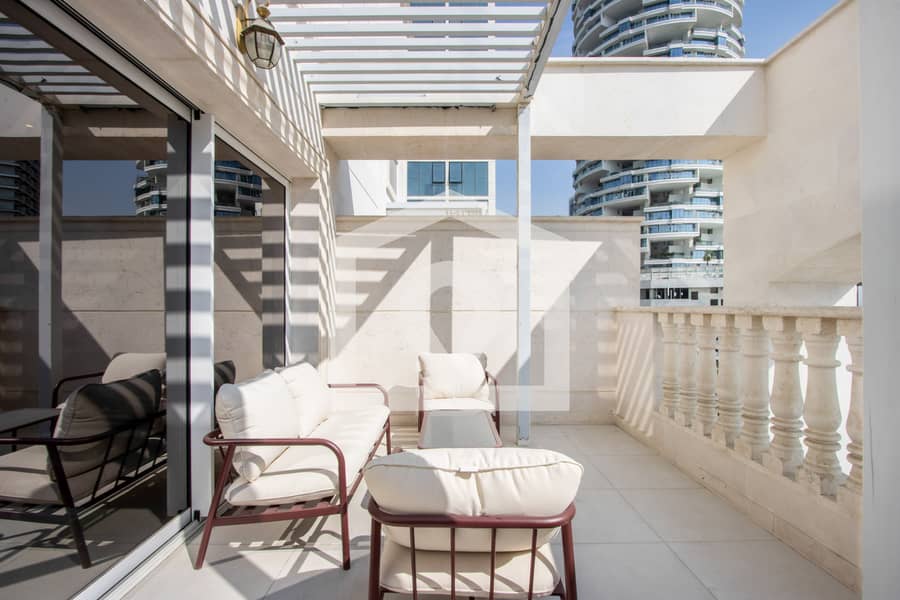 Livbnb-Modern 1BR with Stunning Terrace near JVC Castle Park - Image 29