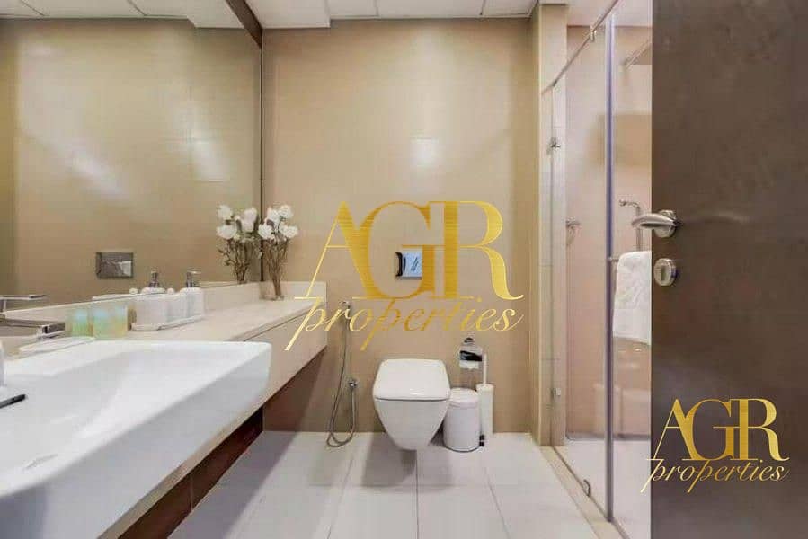 Elegant 1BR in Sparkle Tower with Marina View - Image 11