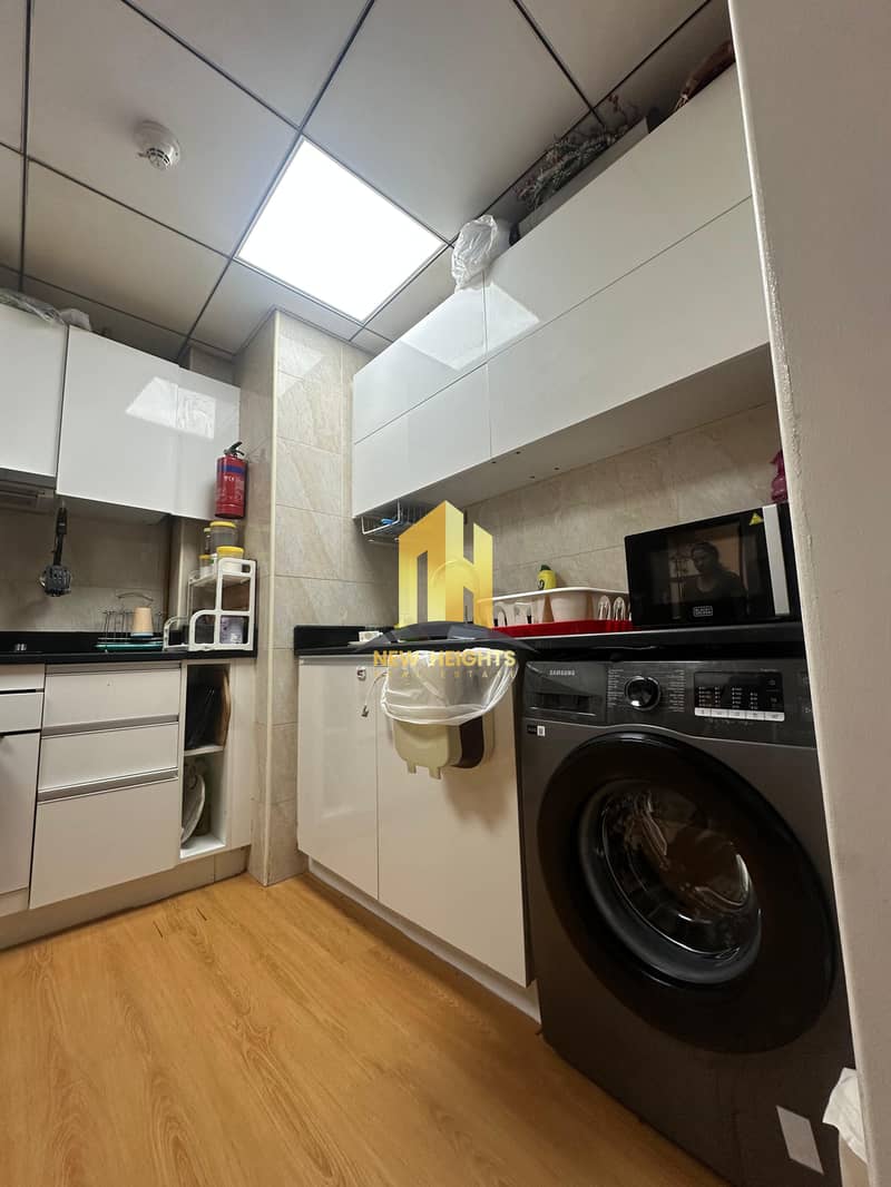 Laya Residences Jumeirah Village Circle (JVC) | Luxurious 1-Bedroom Apartment - Image 11