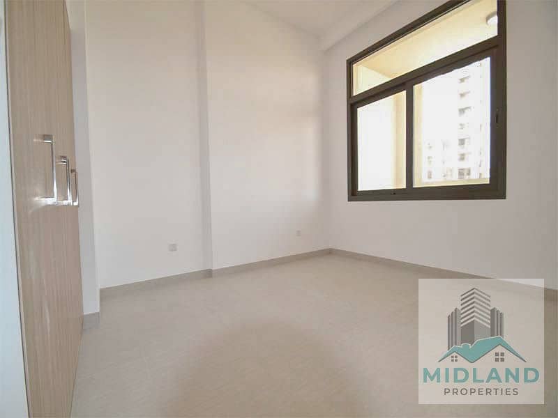 Spacious 1BR + Hall, Park Views, Prime Corner Unit – Town Square - Image 10