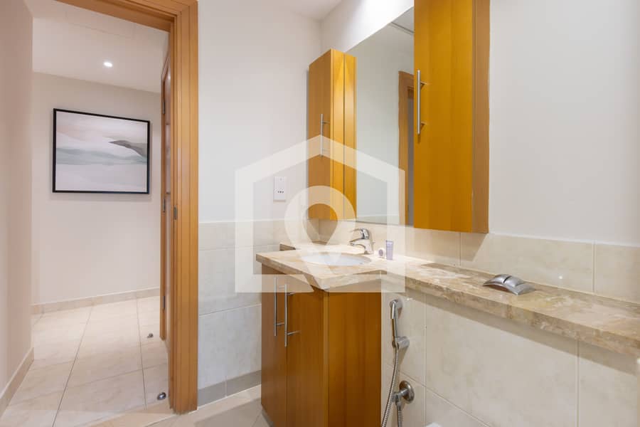 Bright Furnished Apartment with City Views – The Links East Tower - Image 22