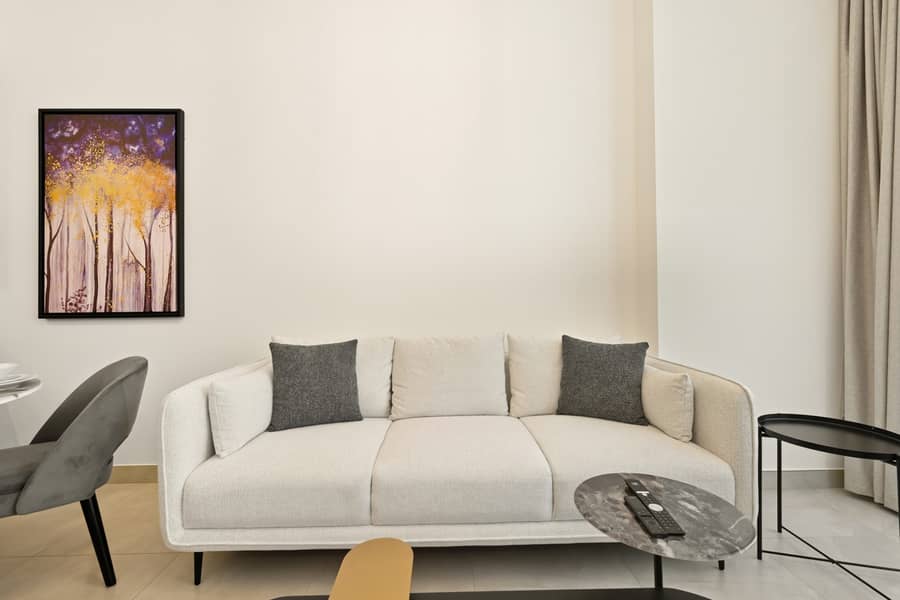 New, Bright & Cozy 1BD at Paragon by IGO, Dubai - Image 12