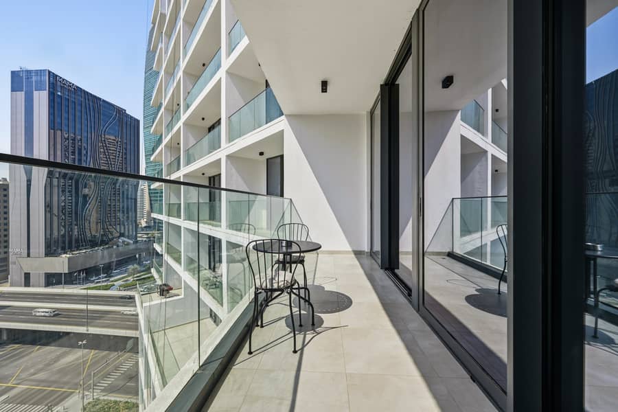 New, Bright & Cozy 1BD at Paragon by IGO, Dubai - Image 19