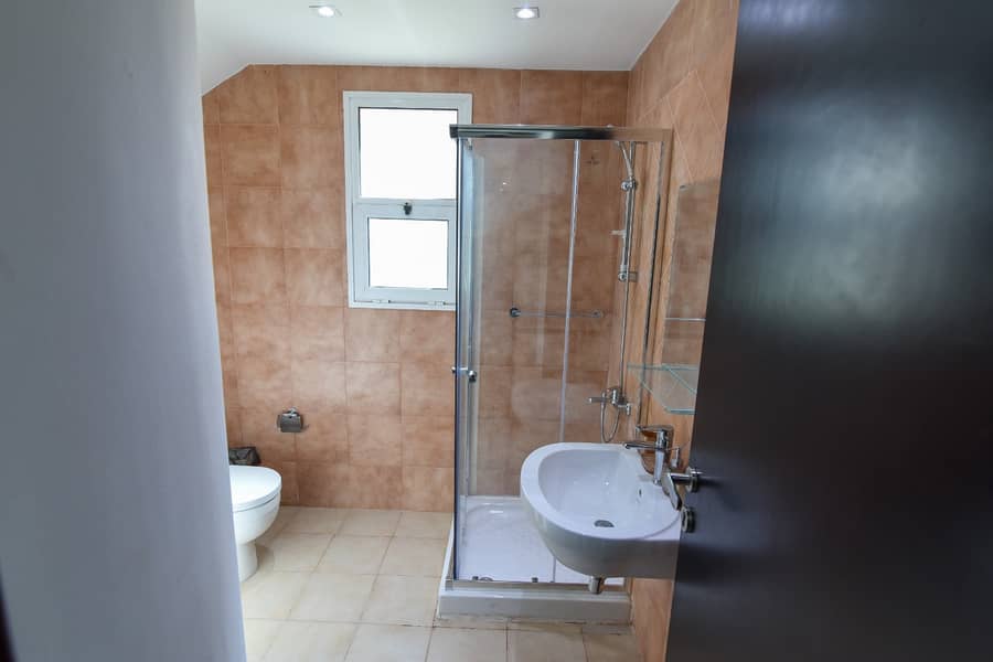 Daily Leasing of Spacious and fully furnished 2-Bedroom Villa with Maid Room, 4 Bathrooms & Huge Garden. - Image 15