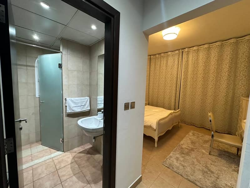 Daily Leasing of Spacious and fully furnished 2-Bedroom Villa with Maid Room, 4 Bathrooms & Huge Garden. - Image 8