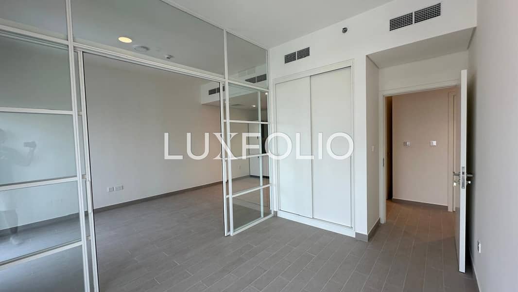 High Floor | Golf + Pool View | Vacant