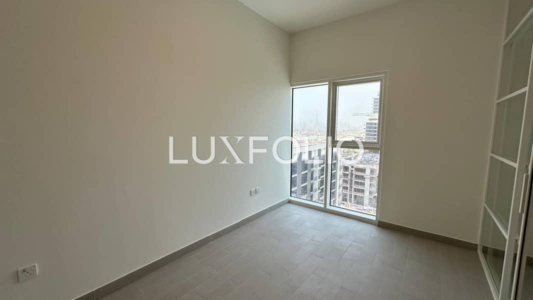 High Floor | Golf + Pool View | Vacant