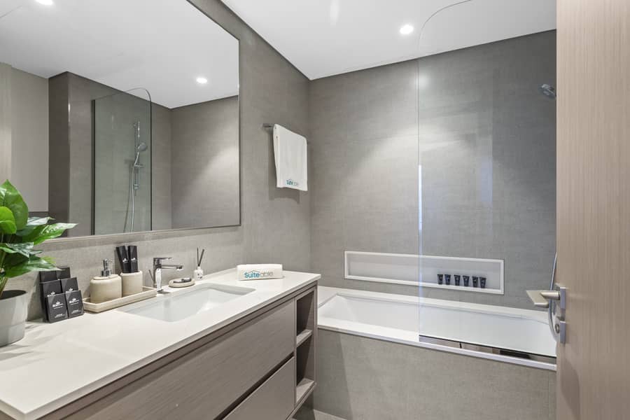 Downtown Luxe Retreat | Modern 2BR Facing Burj Khalifa - Image 11